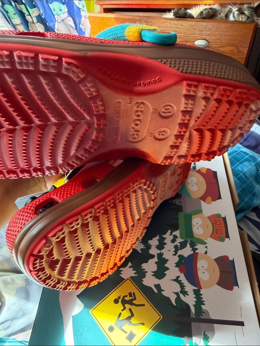 CROCS Kids Red Clog with Brown Sole and Teal Strap Accents